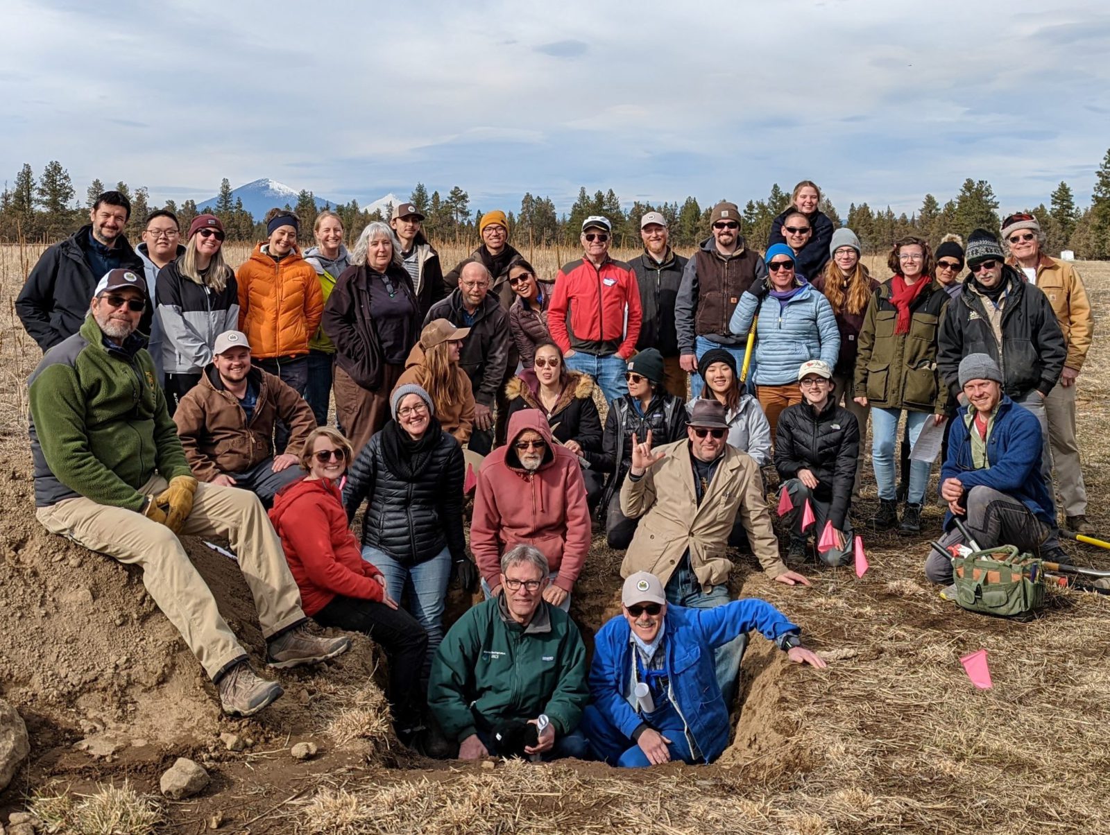 Photo of OSSS members at a soil pit from our 2022 Winter Meeting in Bend, OR.